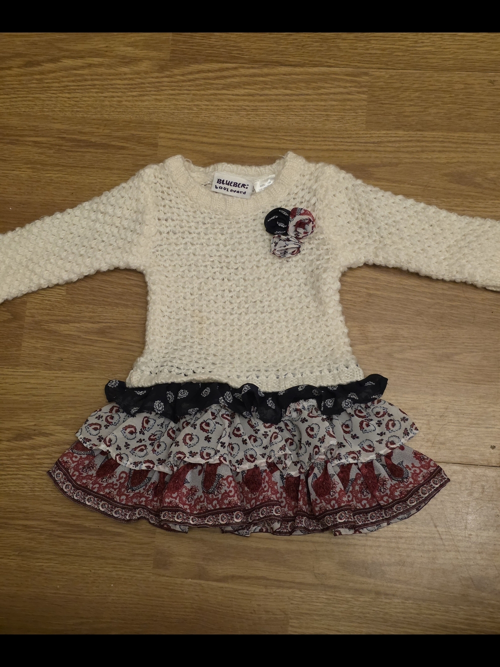 Blueberi Boulevard Cream Knit Dress with Red & Black Patterned Ruffles